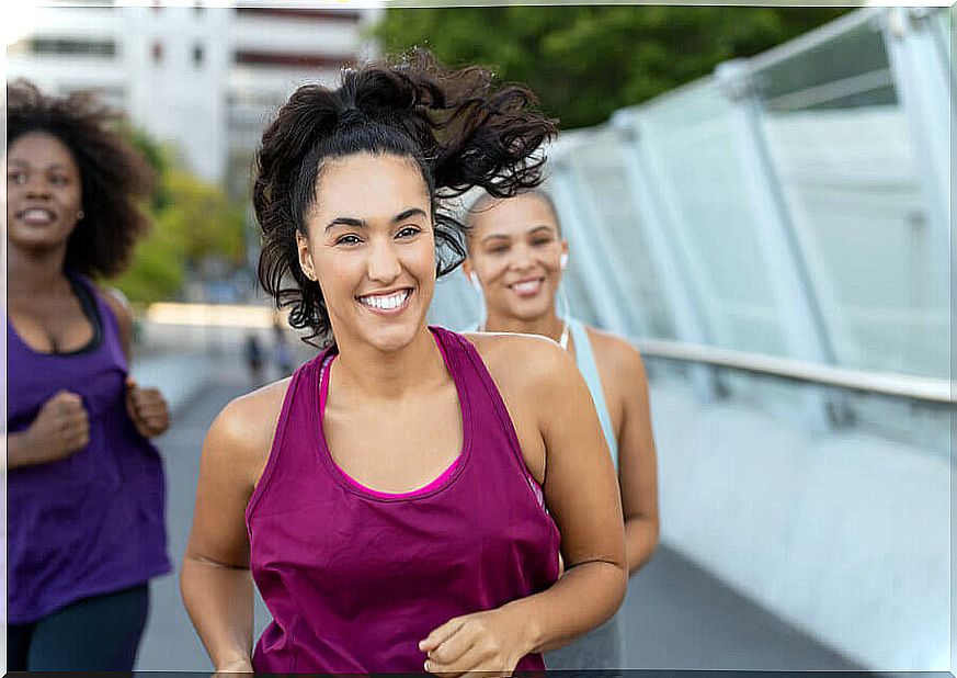 Women running in a group.