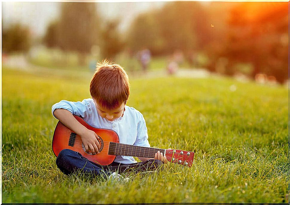 Boy playing guitar