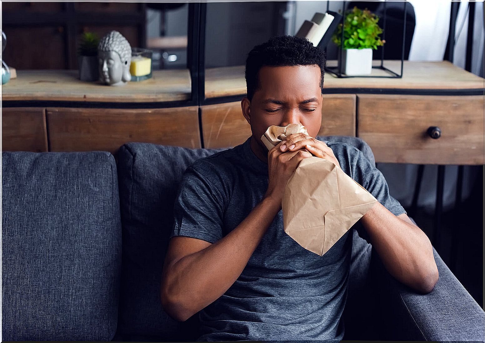 Breathing into a paper bag helps calm anxiety.