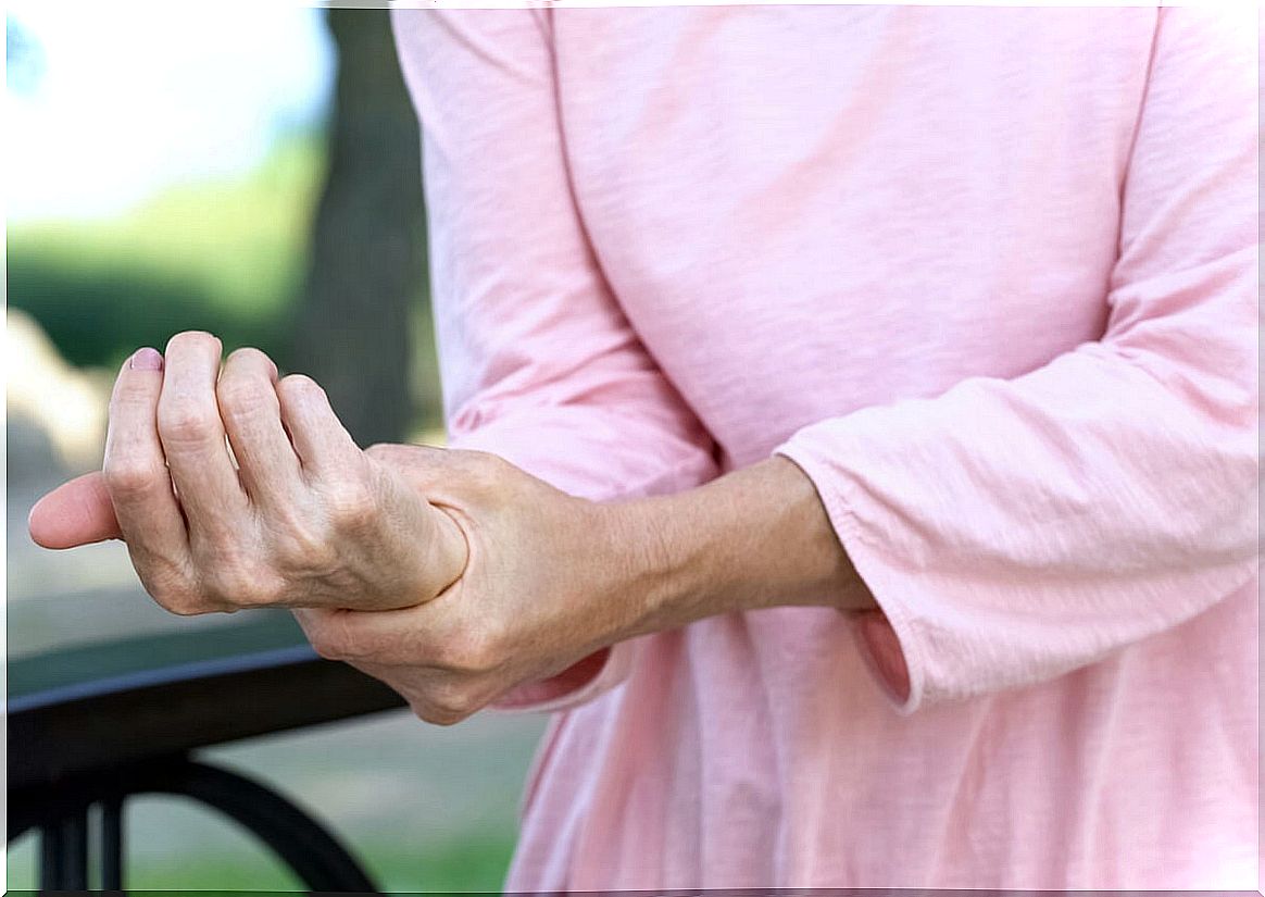 Woman with rheumatoid arthritis pain.