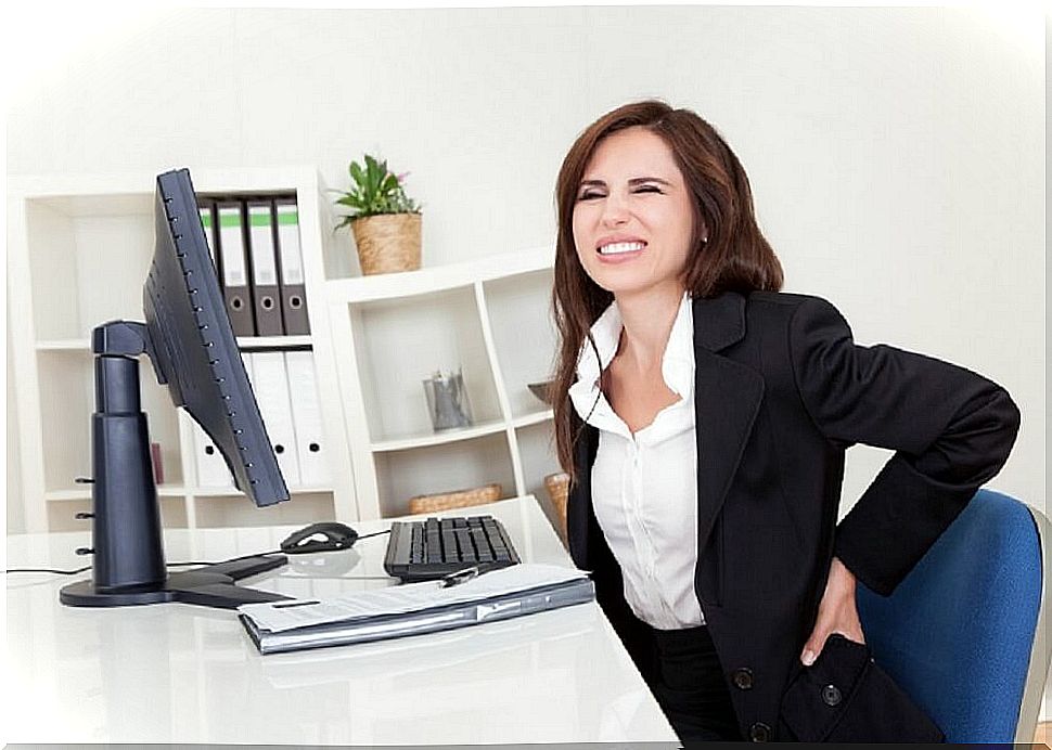 Woman with back pain from poor posture